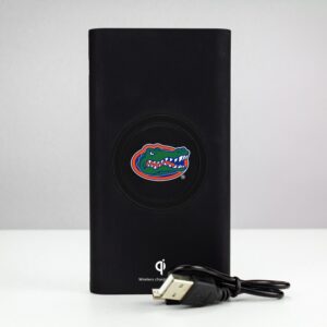 A Florida Gators 8000WX Wireless Mobile Charger - Qi Certified with a university of florida gators logo, accompanied by a usb cable, against a gray background.