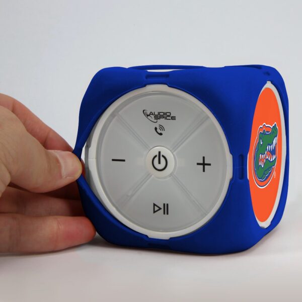 A blue and orange FLORIDA GATORS MX-300 CUBIO BLUETOOTH® SPEAKER with simple control buttons.