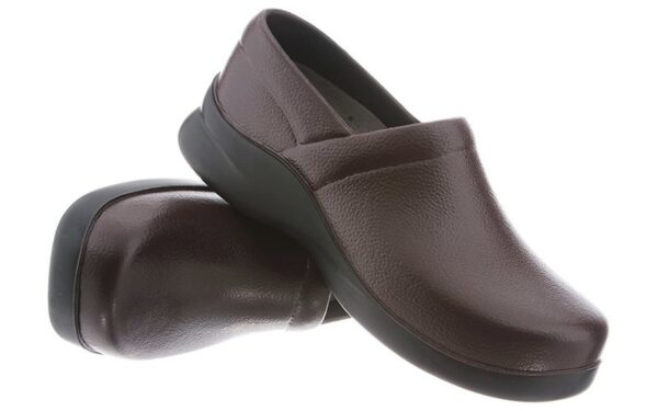 A pair of Boca brown leather slip-on shoes against a white background.