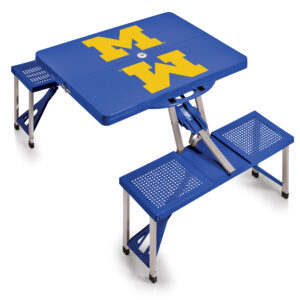 A portable blue Michigan Wolverines picnic table featuring the university of michigan logo on the tabletop, with attached folding seats.