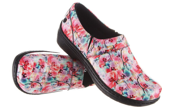 A pair of Mission Prints clogs with a glossy finish, featuring vibrant pink and green colors on a white background.