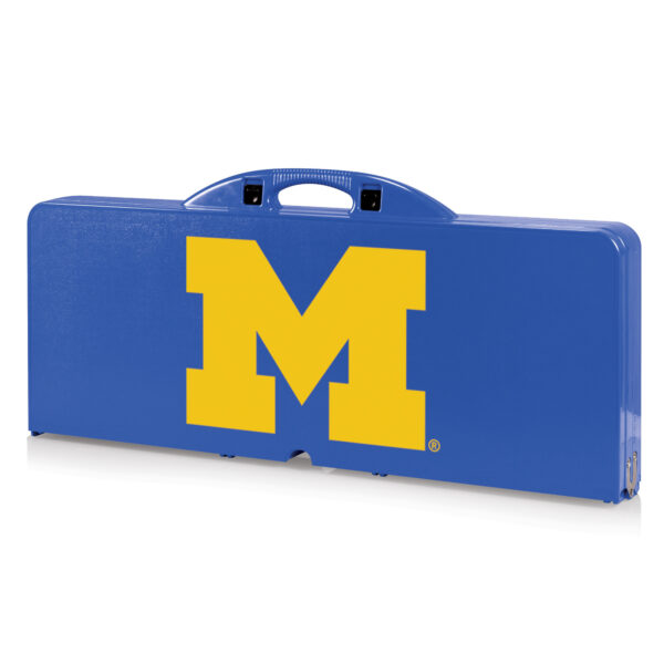 Blue Michigan Wolverines picnic table featuring a large yellow "m" logo on the side, with a black handle on top.