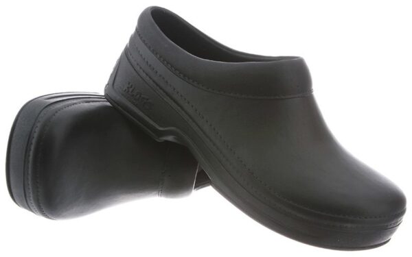 A pair of Zest black leather clogs on a white background. the shoes feature a closed back and plain design, suited for professional use.