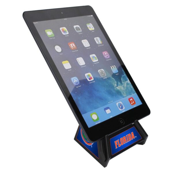 An Florida Gators Pyramid Phone & Tablet Stand standing upright, with an iPad resting on it, displaying colorful app icons on its screen.