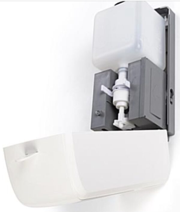 Close-up of an open Hand Sanitizer Dispenser (Refillable) mounted on a wall, showing its internal mechanism and hand sanitizer container.