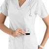 A smiling healthcare worker in a white uniform inserts a CROSS FLEX V-NECK MEDIA SCRUB TOP C12110 into her pocket.