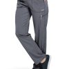 A person wearing FLAT FRONT STRAIGHT LEG PANT C52106 with zippers and sneakers, cropped at the waist, posing against a white backdrop.
