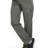 A person wearing FLAT FRONT STRAIGHT LEG PANT C52106 with multiple pockets and black sneakers. Only the lower half of the body is shown.
