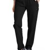 Woman standing in Comfort Waist Utility Cargo Pants with a side pocket, paired with grey slip-on shoes.