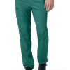 Person wearing CARHARTT C55106 - MEN'S ATHLETIC CARGO PANT and black sneakers, focusing on the lower half of the body.