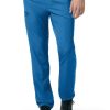 Person wearing CARHARTT C55106 - MEN'S ATHLETIC CARGO PANT and black shoes, standing with hand slightly tucked into the pocket.