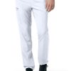 A person wearing white medical scrubs and black shoes, shown from the waist down, with a focus on the Carhartt C55106 - Men's Athletic Cargo Pant.