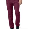 A person wearing dark red Carhartt C55106 - Men's Athletic Cargo Pant and black sneakers, with hands partially tucked into pockets.