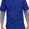 Man in a SOLID RIPSTOP SCRUB UTILITY TOP (Men's C15108) and gray undershirt, focusing on the upper half of his body.