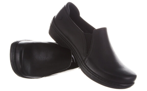 A pair of Moxy by Klogs Footwear black leather slip-on shoes on a white background.