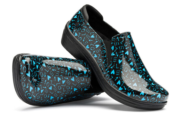 A pair of Moxy by Klogs Footwear slip-on shoes in black and teal pattern on a white background.