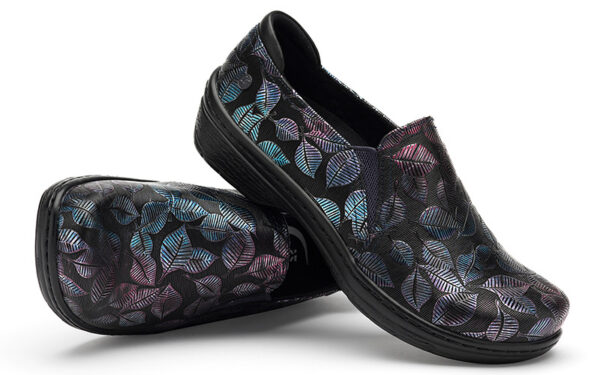 A pair of Moxy by Klogs Footwear black slip-on shoes with a colorful leaf pattern design, placed side by side on a white background.