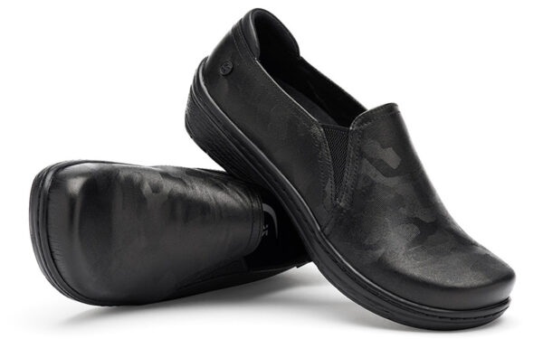 A pair of Moxy by Klogs Footwear slip-on shoes set against a white background.