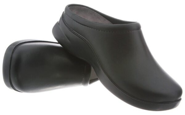 Sentence with Product Name: A pair of black, slip-on professional Dusty, positioned against a white background.
