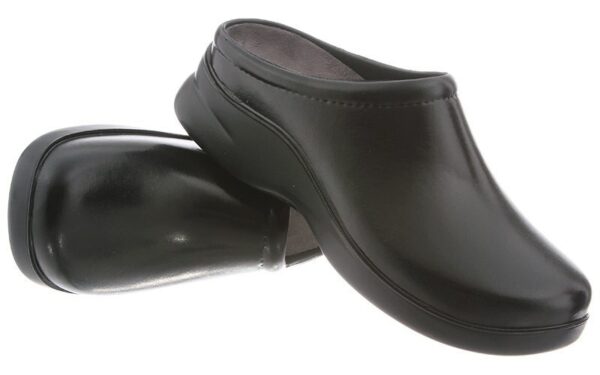 A pair of Dusty black leather clogs isolated on a white background.