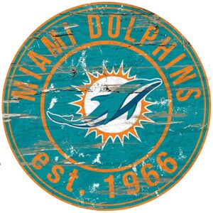 Weathered circular logo of the Miami Dolphins Football and My Dog Sign, featuring a teal and orange color scheme, an emblem of a dolphin and the establishment year 1966.