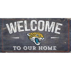 A Jacksonville Jaguars Football and My Dog sign reads "welcome to our home" with a snarling jaguar head illustration in the center, set against a weathered wood background.
