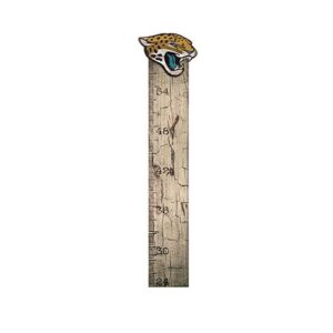 A wooden ruler marked with inches, topped with a decorative metal Jacksonville Jaguars Football and My Dog Sign head.