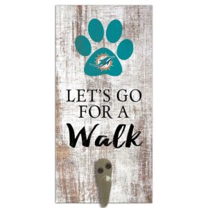 Decorative door hanger with a Miami Dolphins Football and My Dog Sign design featuring a teal paw print above the phrase "let's go for a walk" with a metal hook.