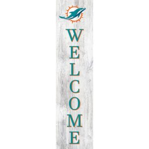 A vertical welcome sign featuring the Miami Dolphins Football and My Dog logo above blue and teal letters on a weathered white wooden plank.