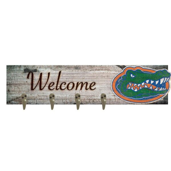 A University of Florida Coat Hanger 6x24 featuring a colorful alligator illustration and three metal hooks, attached to a weathered wood background.