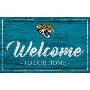 A weathered blue wooden sign with "welcome to our home" in white script and a Jacksonville Jaguars Football and My Dog Sign illustration in the top left corner.