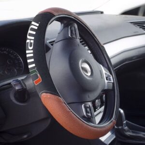 Close-up of a car steering wheel featuring a Miami Hurricanes Sports Grip Steering Wheel Cover with integrated controls and a partial view of the dashboard.