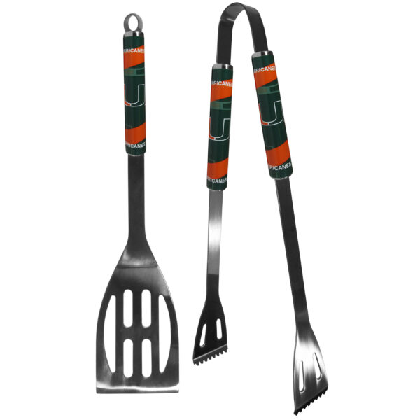 Grilling utensil set with Miami Hurricanes 2 pc Steel BBQ Tool Set branding, including a spatula and tongs, both featuring green and orange handles.