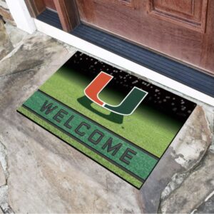 A Miami Hurricanes Crumb Rubber Door Mat featuring the University of Miami logo with a green background and the word "welcome" at a house entrance.