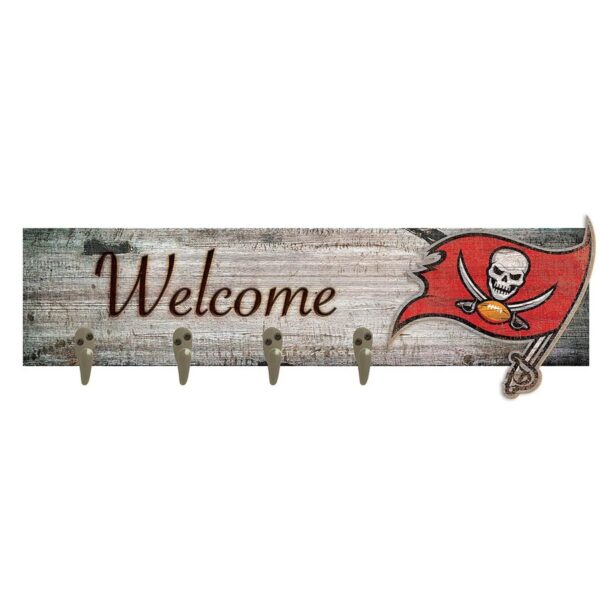 Wooden "welcome" sign with a pirate flag design and four hooks, mounted on a distressed wood background.
