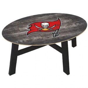 Oval coffee table with dark wood finish and a pirate flag design on the tabletop, featuring a skull, swords, and a red scarf.