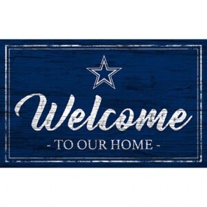 A rectangular sign featuring a dark blue wooden background and the word "welcome" in cursive white letters with "to our home" and a white star above.