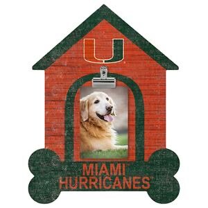 Decorative sign shaped like a house with a photo of a golden retriever and the text "miami hurricanes" on a green and red background.