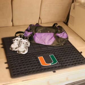 A duffel bag and a pair of sneakers placed on a University of Miami Hurricanes Heavy Duty Vinyl Cargo Mat.