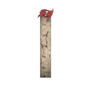 Wooden growth chart with pirate flag design at the top, measuring heights from 24 to 60 inches.