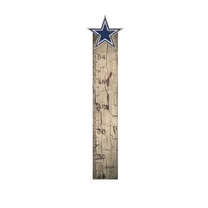 Wall growth chart designed to look like a vertical ruler, topped with a blue star, featuring measurements in inches.