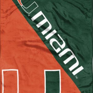 A Miami Hurricanes Blanket 46x60 Micro Raschel Halftone Design Rolled featuring a large orange and green diagonal stripe with the letter "u" logo at the bottom and the word "miami" across the stripe.