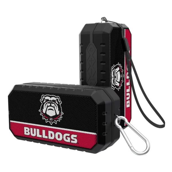 Two black portable bluetooth speakers branded with "Georgia Bulldogs" and a bulldog logo, featuring rugged design and a carabiner clip.