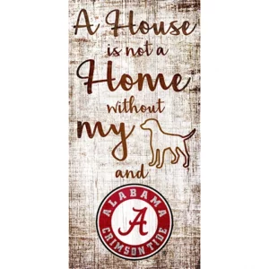 Decorative sign with text "a house is not a home without my dog and alabama crimson tide," featuring a dog silhouette and university of alabama logo on a wood-textured background.