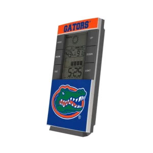 FLORIDA GATORS SOLID WORDMARK DIGITAL DESK CLOCK featuring the University of Florida gators logo, displaying time and temperature readings on a light background.