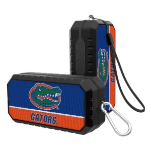 Two FLORIDA GATORS SOLID WORDMARK BLUETOOTH SPEAKERS, featuring a rugged black and blue design with carabiner clips.