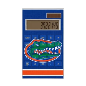 A FLORIDA GATORS STRIPE DESKTOP CALCULATOR with a blue number pad and an illustration of an alligator on it, displaying the number 7327.05 on its screen.
