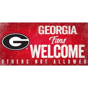 Red sign with "georgia fans welcome others not allowed" text featuring the georgia bulldogs logo in black and white.