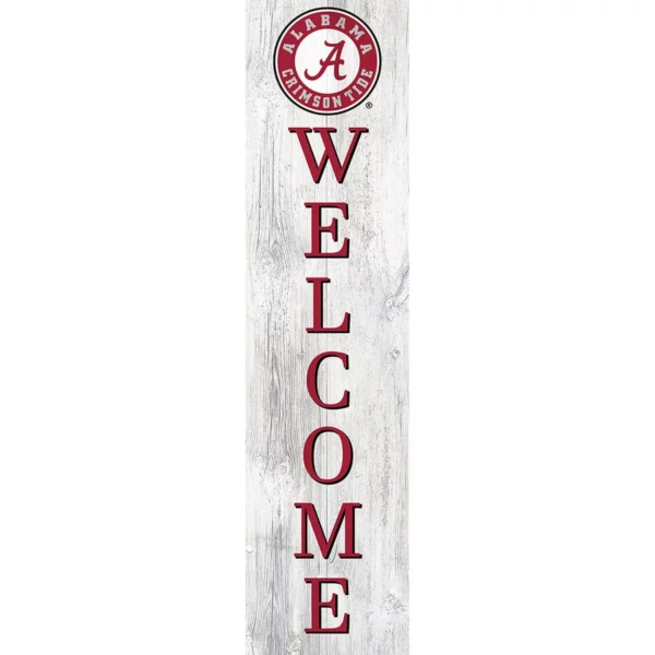 Vertical "welcome" sign on a weathered wood plank with the alabama crimson tide logo at the top.