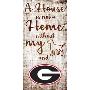 Decorative sign reading "a house is not a home without my" followed by a dog silhouette and the university of georgia logo.